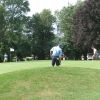 10-mike-sizing-up-a-tough-putt-on-12